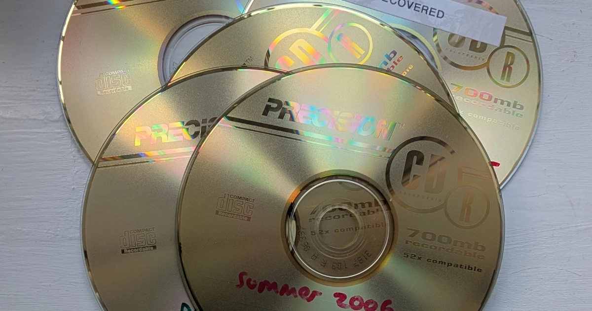 Five recordable CDs from 2006, one labelled Summer 2006 and one marked recovered